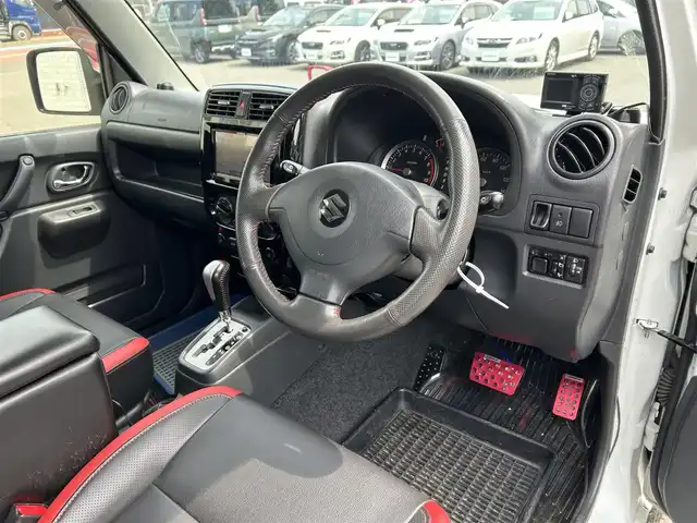 スズキ ジムニー クロスアドベンチャー 道東・釧路十勝 2014(平26)年 4.9万km パールホワイト パートタイム4WD/社外ナビ/(AM FM BT CD DVD フルセグTV)/バックカメラ/シートヒーター /リフトアップ/ETC/社外足回り/社外ステップ/社外前後バンパー/社外スキッドプレート/純正フロアマット/ドアバイザー/革巻きステアリング/LEDヘッドライト/フォグランプ/社外ナンバー移動キット