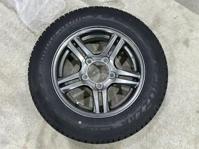 スズキ ジムニー クロスアドベンチャー 道東・釧路十勝 2014(平26)年 4.9万km パールホワイト パートタイム4WD/社外ナビ/(AM FM BT CD DVD フルセグTV)/バックカメラ/シートヒーター /リフトアップ/ETC/社外足回り/社外ステップ/社外前後バンパー/社外スキッドプレート/純正フロアマット/ドアバイザー/革巻きステアリング/LEDヘッドライト/フォグランプ/社外ナンバー移動キット