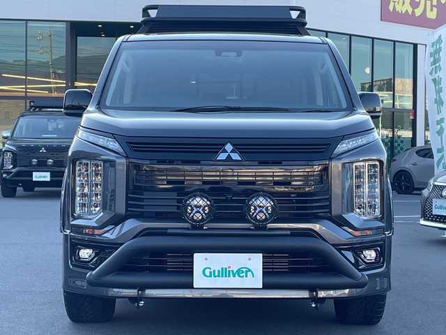 三菱 デリカＤ：５ アーバンギア G パワーパッケージ 長野県 2019(平31)年 3.2万km アイガーグレーメタリック 禁煙車/社外7インチナビ(AM/FM/DVD/TV/Bluetooth)/パートタイム4WD/両側電動スライドドア/電動リアゲート/全方位カメラ/バックカメラ/レーダークルーズコントロール/GIGEARオフロードギア/・アルミルーフラック/・フロントグリルカバー/・LEDフォグランプ/・オーバーフェンダーカバー/・リアラダー/1.5インチリフトアップ/ブラウンレザーシートカバー/社外17インチアルミ(235/65R17)/フルセグTV/ETC/革巻きステアリング/ステアリングスイッチ/運転席電動シート/前席シートヒーター/オートライト/オートハイビーム/衝突被害軽減装置/車線逸脱警報システム/レーンキープアシスト/ＭＴモード付ＡＴ/パドルシフト/プッシュスタート/スマートキー/スペアキー