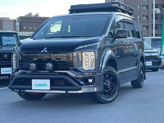 三菱 デリカＤ：５ アーバンギア G パワーパッケージ 長野県 2019(平31)年 3.2万km アイガーグレーメタリック 禁煙車/社外7インチナビ(AM/FM/DVD/TV/Bluetooth)/パートタイム4WD/両側電動スライドドア/電動リアゲート/全方位カメラ/バックカメラ/レーダークルーズコントロール/GIGEARオフロードギア/・アルミルーフラック/・フロントグリルカバー/・LEDフォグランプ/・オーバーフェンダーカバー/・リアラダー/1.5インチリフトアップ/ブラウンレザーシートカバー/社外17インチアルミ(235/65R17)/フルセグTV/ETC/革巻きステアリング/ステアリングスイッチ/運転席電動シート/前席シートヒーター/オートライト/オートハイビーム/衝突被害軽減装置/車線逸脱警報システム/レーンキープアシスト/ＭＴモード付ＡＴ/パドルシフト/プッシュスタート/スマートキー/スペアキー