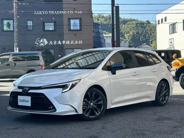トヨタ カローラツーリング ダブルバイビー 静岡県 2022(令4)年 0.6万km プラチナホワイトパールマイカ ワンオーナー/純正ナビ/フルセグTV/BT/USB/バックカメラ/ハーフレザーシート/前席シートヒーター/プリクラッシュセーフティ/レーンキープアシスト/オートハイビーム/レーダークルーズコントロール/ブラインドスポットモニター/ヘッドアップディスプレイ/クリアランスソナー/AC100V電源/置くだけ充電/ステアリングヒーター/ビルトインETC2.0/TVキャンセラー/LEDライト/LEDフォグ/スマートキー×2/保証書/取扱説明書/ナビ取扱説明書/R5/R7点検記録簿有