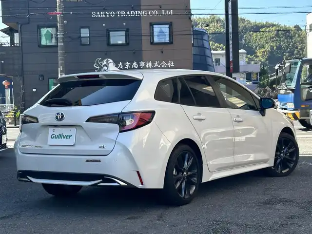 トヨタ カローラツーリング ダブルバイビー 静岡県 2022(令4)年 0.6万km プラチナホワイトパールマイカ ワンオーナー/純正ナビ/フルセグTV/BT/USB/バックカメラ/ハーフレザーシート/前席シートヒーター/プリクラッシュセーフティ/レーンキープアシスト/オートハイビーム/レーダークルーズコントロール/ブラインドスポットモニター/ヘッドアップディスプレイ/クリアランスソナー/AC100V電源/置くだけ充電/ステアリングヒーター/ビルトインETC2.0/TVキャンセラー/LEDライト/LEDフォグ/スマートキー×2/保証書/取扱説明書/ナビ取扱説明書/R5/R7点検記録簿有