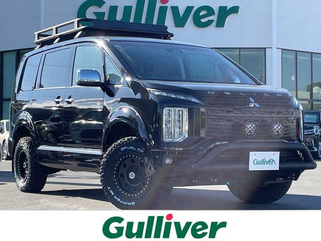 三菱 デリカＤ：５ P 長野県 2021(令3)年 5.7万km ダイヤモンドブラックマイカ 禁煙車/10インチディスプレイオーディオ/(AM/FM/Bluetooth/AppleCarPlay)/ディーゼルターボ/パートタイム4WD/GIGEARオフロードギア/(グリルガード/LEDフォグ/全オーバーフェンダー/リアラダー//ルーフラック)/1.5インチリフトアップ/GIG METAL ROCK16インチAW(235/70R16)/マッドガード/オートステップ/純正足回り車載/全方位カメラ/両側電動スライドドア/電動リアゲート/運転席電動シート/前席シートヒーター/レザーシートカバー/革巻きステアリング/ステアリングヒーター/ステアリングスイッチ/ブラインドスポットモニター/LEDヘッドライト/追従型クルーズコントロール/プッシュスタート/衝突被害軽減装置/車線逸脱警報装置/レーンキープアシスト/オートライト/オートハイビーム/フォグランプ/アイドリングストップ/バックカメラ/スマートキー/ＭＴモード付ＡＴ/パドルシフト/純正フロアマット