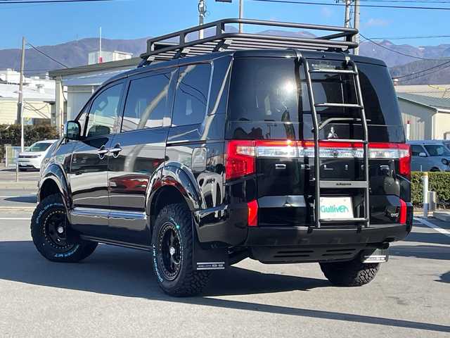 三菱 デリカＤ：５ P 長野県 2021(令3)年 5.7万km ダイヤモンドブラックマイカ 禁煙車/10インチディスプレイオーディオ/(AM/FM/Bluetooth/AppleCarPlay)/ディーゼルターボ/パートタイム4WD/GIGEARオフロードギア/(グリルガード/LEDフォグ/全オーバーフェンダー/リアラダー//ルーフラック)/1.5インチリフトアップ/GIG METAL ROCK16インチAW(235/70R16)/マッドガード/オートステップ/純正足回り車載/全方位カメラ/両側電動スライドドア/電動リアゲート/運転席電動シート/前席シートヒーター/レザーシートカバー/革巻きステアリング/ステアリングヒーター/ステアリングスイッチ/ブラインドスポットモニター/LEDヘッドライト/追従型クルーズコントロール/プッシュスタート/衝突被害軽減装置/車線逸脱警報装置/レーンキープアシスト/オートライト/オートハイビーム/フォグランプ/アイドリングストップ/バックカメラ/スマートキー/ＭＴモード付ＡＴ/パドルシフト/純正フロアマット