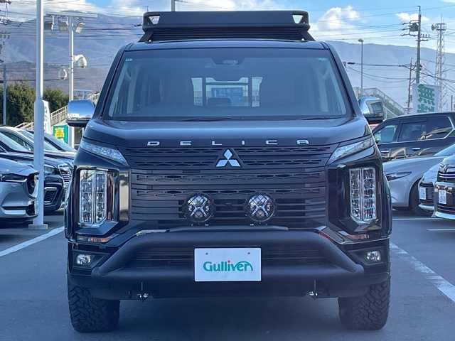 三菱 デリカＤ：５ P 長野県 2021(令3)年 5.7万km ダイヤモンドブラックマイカ 禁煙車/10インチディスプレイオーディオ/(AM/FM/Bluetooth/AppleCarPlay)/ディーゼルターボ/パートタイム4WD/GIGEARオフロードギア/(グリルガード/LEDフォグ/全オーバーフェンダー/リアラダー//ルーフラック)/1.5インチリフトアップ/GIG METAL ROCK16インチAW(235/70R16)/マッドガード/オートステップ/純正足回り車載/全方位カメラ/両側電動スライドドア/電動リアゲート/運転席電動シート/前席シートヒーター/レザーシートカバー/革巻きステアリング/ステアリングヒーター/ステアリングスイッチ/ブラインドスポットモニター/LEDヘッドライト/追従型クルーズコントロール/プッシュスタート/衝突被害軽減装置/車線逸脱警報装置/レーンキープアシスト/オートライト/オートハイビーム/フォグランプ/アイドリングストップ/バックカメラ/スマートキー/ＭＴモード付ＡＴ/パドルシフト/純正フロアマット