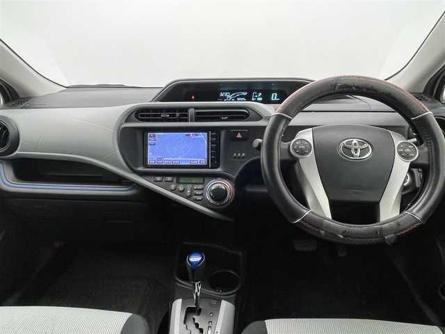 トヨタ アクア S 茨城県 2014(平26)年 9.1万km ライムホワイトパールクリスタルシャイン (株)IDOMが運営する【じしゃロン水戸店】の自社ローン専用車両になりますこちらは現金またはオートローンご利用時の価格です。自社ローンご希望の方は別途その旨お申付け下さい/純正SDナビ(NSCP-W64)/　・ワンセグTV/　・Bluetooth/バックカメラ/ETC/プッシュスタート/スマートキー/ステアリングリモコン/ライトレベライザー/オートライト/ECO・EVモード/ウインカーミラー/純正フロアマット/ドアバイザー