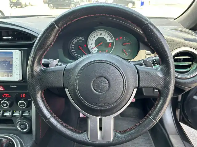 トヨタ ８６ GT リミテッド 和歌山県 2012(平24)年 10.7万km ダークグレーメタリック (株)IDOMが運営する【じしゃロン和歌山店】の自社ローン専用車両になります。こちらは現金またはオートローンご利用時の価格です。自社ローンご希望の方は別途その旨お申付け下さい/純正７インチナビ/ワンセグTV/BT/CD/バックカメラ　/ＥＴＣ　/ハーフレザーシート/前席シートヒーター　/社外１８インチアルミホイール　/スマートキー　/スペアキー　/プッシュスタート/横滑り防止装置　/オートライト　/パドルシフト　/フロアマット　/ＥＴＣ/社外１８インチアルミ/TRC