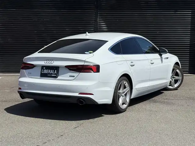アウディ Ａ５ SB 45TFSIクワトロ スポーツ 静岡県 2020(令2)年 4.4万km グレイシアホワイトメタリック Sラインパッケージ/ハーフレザーシート/マトリクLEDヘッドライト/バーチャルコックピット/BSM/電動リアゲート/MMI/(CD/DVD/Bluetooth/フルセグ)/衝突被害軽減システム/360°カメラ/アダプティブクルーズコントロール/レーンキープアシスト/パーキングアシスト/メモリー付パワーシート/シートヒーター /アドバンストキー/ドライブレコーダー/ETC2.0/純正フロアマット/純正18インチアルミホイール/取扱説明書/スペアキー