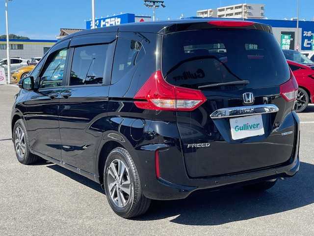 ホンダ フリード ハイブリット G 長崎県 2023(令5)年 1.1万km クリスタルブラックパール 純正プレミアムインターナビ/CD/DVD/BT/USB/フルセグTV/バックカメラ/両側パワースライドドア/ホンダセンシング/レーダークルーズコントロール/レーンキープアシスト/ハーフレザーシート/D/N席シートヒーター/ステアリングスイッチ/ドライブレコーダー/LEDヘッドライト/ビルトインETC