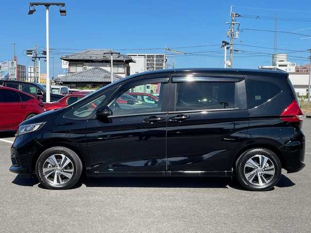 ホンダ フリード ハイブリット G 長崎県 2023(令5)年 1.1万km クリスタルブラックパール 純正プレミアムインターナビ/CD/DVD/BT/USB/フルセグTV/バックカメラ/両側パワースライドドア/ホンダセンシング/レーダークルーズコントロール/レーンキープアシスト/ハーフレザーシート/D/N席シートヒーター/ステアリングスイッチ/ドライブレコーダー/LEDヘッドライト/ビルトインETC