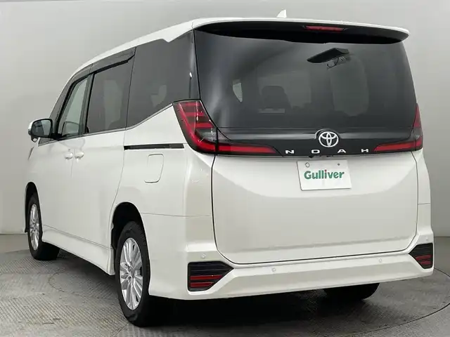 トヨタ ノア S－Z 道央・札幌 2023(令5)年 1.1万km ホワイトパールクリスタルシャイン ・ワンオーナー/・4WD/・寒冷地仕様/・純正メモリナビ/ 　CD／DVD／フルセグ／Bluetooth／Miracast/・バックカメラ/・純正フリップダウンモニター/・両側パワースライドドア/・純正ビルトインETC2.0/・ドライブレコーダー/・トヨタセーフティセンス/・プリクラッシュセーフティ/・レーダークルーズコントロール/・レーンディパーチャーアラート/・ブラインドスポットモニター/・プロアクティブドライビングアシスト/・クリアランスソナー/・リヤクロストラフィックアラート/・パーキングサポートブレーキ/・安心降車アシスト/・ロードサインアシスト/・オートマチックハイビーム/・ワイパーデアイサー/・ハーフレザーシート/・前席シートヒーター/・LEDヘッドライト/・LEDフォグ/・横滑り防止/・プッシュスタート/・スマートキー/・ドアバイザー/・夏タイヤ社外16インチAW積込