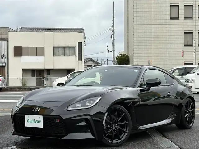 トヨタ ＧＲ８６ RZ 三重県 2022(令4)年 0.8万km クリスタルブラックシリカ SRADレーシングマフラー/ＨＫＳハイパーマックス車高調/トヨタ純正9インチナビ/　・フルセグＴＶ/　・Bluetooth/　・ＤＶＤ再生　　/　・録音/バックカメラ/クルーズコントロール/スマートキーｘ２/プッシュスタート/Ｄ・Ｎ席シートヒーター/ステアリングスイッチ/ドライブレコーダー（前後）/電動格納ミラー/ETC/純正フロアマット/横滑り防止機能