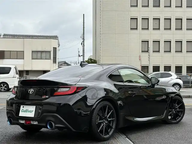 トヨタ ＧＲ８６ RZ 三重県 2022(令4)年 0.8万km クリスタルブラックシリカ SRADレーシングマフラー/ＨＫＳハイパーマックス車高調/トヨタ純正9インチナビ/　・フルセグＴＶ/　・Bluetooth/　・ＤＶＤ再生　　/　・録音/バックカメラ/クルーズコントロール/スマートキーｘ２/プッシュスタート/Ｄ・Ｎ席シートヒーター/ステアリングスイッチ/ドライブレコーダー（前後）/電動格納ミラー/ETC/純正フロアマット/横滑り防止機能