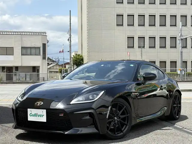 トヨタ ＧＲ８６ RZ 三重県 2022(令4)年 0.8万km クリスタルブラックシリカ SRADレーシングマフラー/ＨＫＳハイパーマックス車高調/トヨタ純正9インチナビ/　・フルセグＴＶ/　・Bluetooth/　・ＤＶＤ再生　　/　・録音/バックカメラ/クルーズコントロール/スマートキーｘ２/プッシュスタート/Ｄ・Ｎ席シートヒーター/ステアリングスイッチ/ドライブレコーダー（前後）/電動格納ミラー/ETC/純正フロアマット/横滑り防止機能