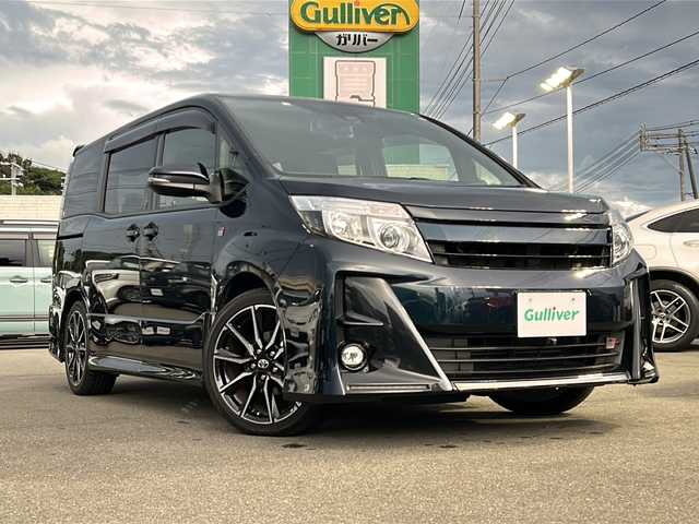 トヨタ ノア Si GRスポーツ 山口県 2018(平30)年 8.4万km ブラッキッシュアゲハガラスフレーク ワンオーナー　/セーフティセンス　/衝突被害軽減ブレーキ/車線逸脱警報/レーダークルーズコントロール/オートマチックハイビーム/標識認識機能/先行車発進お知らせ機能/両側パワースライドドア　/バックカメラ　/デジタルインナーミラー　/純正９インチナビ　/AM/FM/CD/DVD/Bluetooth/フルセグTV　/ＬＥＤヘッド＆フォグライト　/純正フロアマット　　/ドラレコ　/ＥＴＣ
