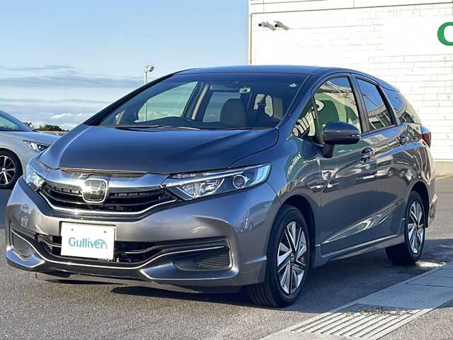 ホンダ シャトル ハイブリッド ホンダセンシング 香川県 2019(平31)年 4.3万km シャイニンググレーM 社外ナビ/フルセグテレビ/CD／DVD再生機能/バックカメラ/ドライブレコーダー/オートライト/レーダー探知機/アイドリングストップ/ETC/スペアキー
