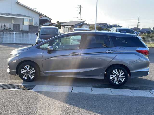 ホンダ シャトル ハイブリッド ホンダセンシング 香川県 2019(平31)年 4.3万km シャイニンググレーM 社外ナビ/フルセグテレビ/CD／DVD再生機能/バックカメラ/ドライブレコーダー/オートライト/レーダー探知機/アイドリングストップ/ETC/スペアキー