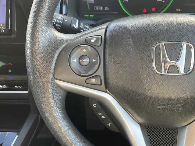 ホンダ シャトル ハイブリッド ホンダセンシング 香川県 2019(平31)年 4.3万km シャイニンググレーM 社外ナビ/フルセグテレビ/CD／DVD再生機能/バックカメラ/ドライブレコーダー/オートライト/レーダー探知機/アイドリングストップ/ETC/スペアキー