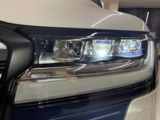 トヨタ ランドクルーザー AX 埼玉県 2023(令5)年 0.3万km ホワイトパールクリスタルシャイン ワンオーナー /AIS検査済み/7人乗り/禁煙車 /OPサンルーフ /ルーフレール /ナビTV /ブラインドスポット /追従クルコン /オートハイビーム /センターデフロック /マルチテレイン /ダウンヒルアシストコントロール/クロールコントロール /レーンキープ /360カメラ /MTモード/LEDヘッドライト
