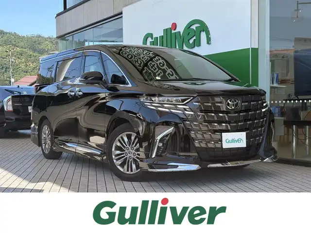 トヨタ アルファードハイブリット Z 京都府 2025(令7)年 1.5万km ブラック ワンオーナー/モデリスタエアロ/14インチディスプレイオーディオプラス/　地デジ、AMFMラジオ/USB/HDMI/ETC2.0/ユニバーサルステップ/セーフティセンス/ブライングスポットモニター/床下透過表示機能付パノラミックビューモニター/3眼ヘッドライトランプ/予約機能付きパワースライドドア/デジタルインナーミラー/ドライブレコーダー（前後方）/置くだけ充電/保証書/取扱説明書/スペアキー