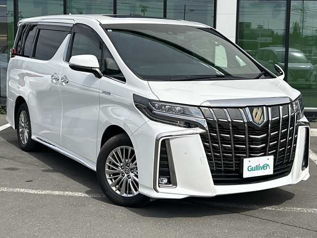 トヨタ アルファードハイブリット S タイプゴールド 道東・釧路十勝 2021(令3)年 7万km ホワイトパールクリスタルシャイン ・4WD/・純正9インチナビ/（BT・FM・AM・フルセグ）/・バックカメラ/・ツインサンルーフ/・両側パワースライドドア/・レーダークルーズコントロール/・リアオートエアコン/・電動リアゲート/・コーナーセンサー/・純正アルミホイール/・ブラインドスポットモニター/・LEDヘッドライト/・インテリジェントミラー/・オートマチックハイビーム/・ドライブレコーダー/・ETC/・ステアリングスイッチ/・スマートキー/・プッシュスタート/・AC100V