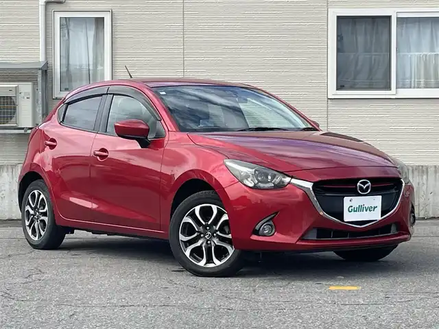 マツダ デミオ XD ツーリング 青森県 2015(平27)年 7.4万km ソウルレッドプレミアムメタリック AIS評価3.5点　外装C内装C/４WD/ターボ車/マツダ純正ナビ/AM/FM/DVD/ワンセグ/USB/AUX/Bluetooth/純正エンジンスターター/クルーズコントロール/衝突軽減システム/バックカメラ/ヘッドアップディスプレイ/ドライブレコーダー/TVキャンセラー/プッシュスタート/HIDヘッドライト/スペアキー/純正フロアマット/社外AW１５インチスタッドレスタイヤ車載/取扱説明書/保証書
