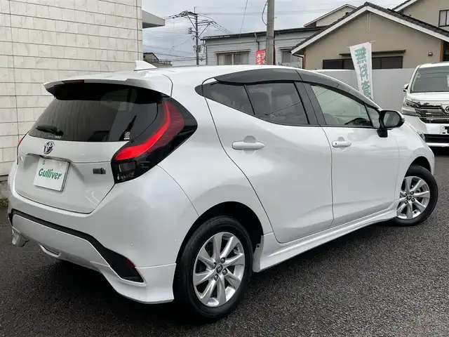 トヨタ アクア Z 大分県 2021(令3)年 2.8万km プラチナホワイトパールマイカ モデリスタエアロ/メーカーナビ 【BTオーディオ】/全方位カメラ/ハーフレザー調シート/純正15インチアルミホイール/レーンアシスト/プリクラッシュセーフティ/レーダークルーズコントロール/パーキングアシスト/クリアランスソナー/充電用USBソケット（Cタイプ）/AC100V電源/運転席パワーシート/前席シートヒーター/LEDヘッドライト/LEDフォグランプ/オートライト/オートマチックハイビーム/ヘッドライトレベライザー/レザーステアリング/ステアリングヒーター/ステアリングリモコン/チルトステアリング/ウインカーミラー/エンジンプッシュスタート/リアプライバシーガラス/横滑り防止装置/ドアバイザー/フロアマット/オートリトラミラー/サイド＆Wエアバッグ/ABS/スマートキー×2/保証書/車両取説/ナビ取説
