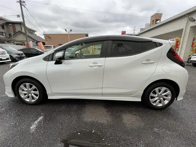トヨタ アクア Z 大分県 2021(令3)年 2.8万km プラチナホワイトパールマイカ モデリスタエアロ/メーカーナビ 【BTオーディオ】/全方位カメラ/ハーフレザー調シート/純正15インチアルミホイール/レーンアシスト/プリクラッシュセーフティ/レーダークルーズコントロール/パーキングアシスト/クリアランスソナー/充電用USBソケット（Cタイプ）/AC100V電源/運転席パワーシート/前席シートヒーター/LEDヘッドライト/LEDフォグランプ/オートライト/オートマチックハイビーム/ヘッドライトレベライザー/レザーステアリング/ステアリングヒーター/ステアリングリモコン/チルトステアリング/ウインカーミラー/エンジンプッシュスタート/リアプライバシーガラス/横滑り防止装置/ドアバイザー/フロアマット/オートリトラミラー/サイド＆Wエアバッグ/ABS/スマートキー×2/保証書/車両取説/ナビ取説