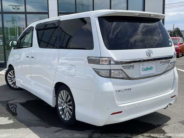 トヨタ ヴェルファイア 2．4Z ゴールデンアイズ 道東・釧路十勝 2013(平25)年 8.6万km ホワイトパールクリスタルシャイン ・寒冷地仕様/・４WD/・社外8インチナビ/　（AM　FM　CD　DVD　SD　BT　TV）/・社外10.2インチフリップダウンモニター/・両側パワースライドドア/・スマートキー/・プッシュスタート/・ナノイー/・フロントワイパーデアイサー/・純正ETC/・純正フロアマット/・オットマン/・3列シート/・横滑り防止装置/・前後コーナーセンサー/・ドアバイザー/・ハーフレザーシート
