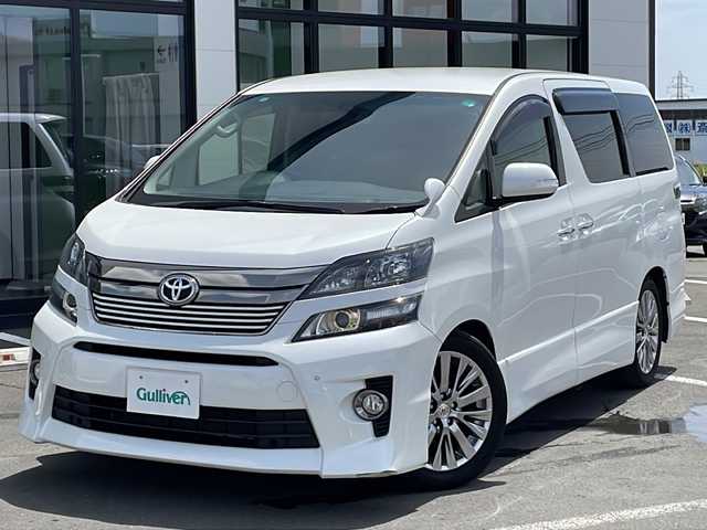 トヨタ ヴェルファイア 2．4Z ゴールデンアイズ 道東・釧路十勝 2013(平25)年 8.6万km ホワイトパールクリスタルシャイン ・寒冷地仕様/・４WD/・社外8インチナビ/　（AM　FM　CD　DVD　SD　BT　TV）/・社外10.2インチフリップダウンモニター/・両側パワースライドドア/・スマートキー/・プッシュスタート/・ナノイー/・フロントワイパーデアイサー/・純正ETC/・純正フロアマット/・オットマン/・3列シート/・横滑り防止装置/・前後コーナーセンサー/・ドアバイザー/・ハーフレザーシート