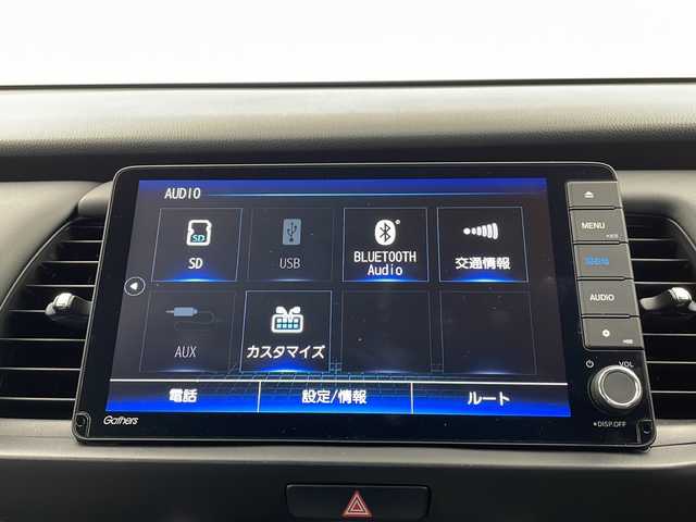 ホンダ フィット e:HEVホーム 栃木県 2021(令3)年 2.7万km プレミアムサンライトホワイトパール 禁煙車/純正ディーラーナビ（VXU-215FTi）/（AM/FM/BT/CD/DVD/フルセグTV）/アダプティブクルーズコントロール/バックカメラ/前後ドライブレコーダー/クリアランスソナー/LEDヘッドライト/オートライト/オートマチックハイビーム/先行車発進お知らせ/路外逸脱抑制制御/レーンキープアシストシステム/オートブレーキホールド/純正フロアマット/プッシュスタート/ドアバイザー/USB接続/ステアリングスイッチ/純正ドアバイザー/プッシュスタート/電動格納ミラー