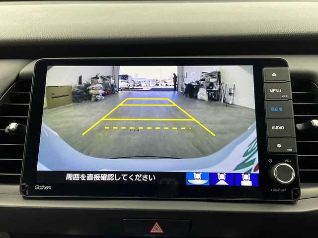 ホンダ フィット e:HEVホーム 栃木県 2021(令3)年 2.7万km プレミアムサンライトホワイトパール 禁煙車/純正ディーラーナビ（VXU-215FTi）/（AM/FM/BT/CD/DVD/フルセグTV）/アダプティブクルーズコントロール/バックカメラ/前後ドライブレコーダー/クリアランスソナー/LEDヘッドライト/オートライト/オートマチックハイビーム/先行車発進お知らせ/路外逸脱抑制制御/レーンキープアシストシステム/オートブレーキホールド/純正フロアマット/プッシュスタート/ドアバイザー/USB接続/ステアリングスイッチ/純正ドアバイザー/プッシュスタート/電動格納ミラー