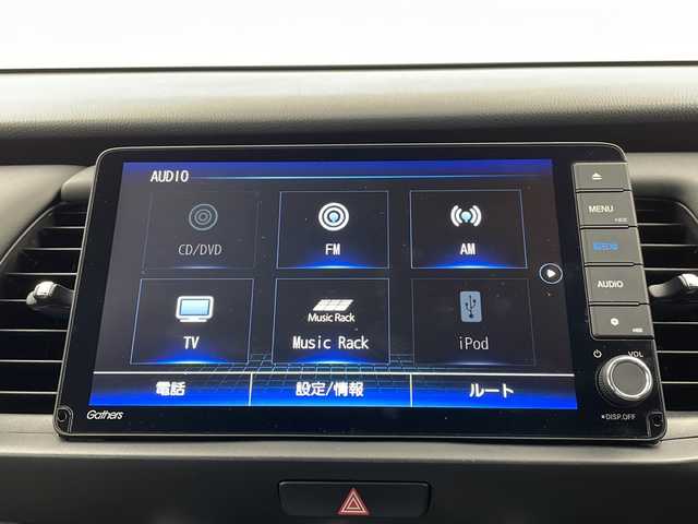 ホンダ フィット e:HEVホーム 栃木県 2021(令3)年 2.7万km プレミアムサンライトホワイトパール 禁煙車/純正ディーラーナビ（VXU-215FTi）/（AM/FM/BT/CD/DVD/フルセグTV）/アダプティブクルーズコントロール/バックカメラ/前後ドライブレコーダー/クリアランスソナー/LEDヘッドライト/オートライト/オートマチックハイビーム/先行車発進お知らせ/路外逸脱抑制制御/レーンキープアシストシステム/オートブレーキホールド/純正フロアマット/プッシュスタート/ドアバイザー/USB接続/ステアリングスイッチ/純正ドアバイザー/プッシュスタート/電動格納ミラー