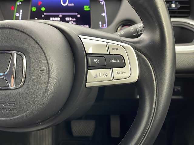ホンダ フィット e:HEVホーム 栃木県 2021(令3)年 2.7万km プレミアムサンライトホワイトパール 禁煙車/純正ディーラーナビ（VXU-215FTi）/（AM/FM/BT/CD/DVD/フルセグTV）/アダプティブクルーズコントロール/バックカメラ/前後ドライブレコーダー/クリアランスソナー/LEDヘッドライト/オートライト/オートマチックハイビーム/先行車発進お知らせ/路外逸脱抑制制御/レーンキープアシストシステム/オートブレーキホールド/純正フロアマット/プッシュスタート/ドアバイザー/USB接続/ステアリングスイッチ/純正ドアバイザー/プッシュスタート/電動格納ミラー