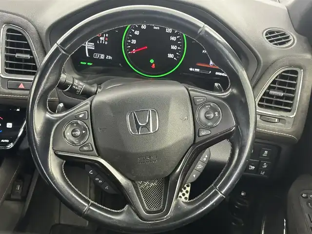 ホンダ ヴェゼル ハイブリッド RS ホンダセンシング 愛知県 2018(平30)年 9.1万km 黒 純正ナビ　/（フルセグ／ＢＴ／ＣＤ／ＤＶＤ）　/衝突軽減システム　/レーダークルーズコントロール　/バックカメラ　/横滑り防止装置　/レーンキープアシスト　/ドラレコ　/前席シートヒーター　/ビルトインETC　/純正AW