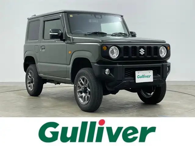 スズキ ジムニー XC 岡山県 2023(令5)年 2.9万km ジャングルグリーン アルパイン9インチナビ/X9NX1/（CD/DVD/TV/BT/USB)/バックカメラ/アルパインミラー型ドライブレコーダー/2インチリフトアップ/社外マフラー/LEDヘッドライト/フォグランプ/オートライト/スズキセーフティーサポート/社外シフト/純正フロアマット/純正ドアバイザー/クルーズコントロール/ETC/取扱説明書/スペアキー×１