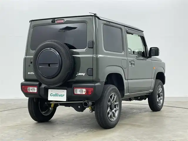 スズキ ジムニー XC 岡山県 2023(令5)年 2.9万km ジャングルグリーン アルパイン9インチナビ/X9NX1/（CD/DVD/TV/BT/USB)/バックカメラ/アルパインミラー型ドライブレコーダー/2インチリフトアップ/社外マフラー/LEDヘッドライト/フォグランプ/オートライト/スズキセーフティーサポート/社外シフト/純正フロアマット/純正ドアバイザー/クルーズコントロール/ETC/取扱説明書/スペアキー×１