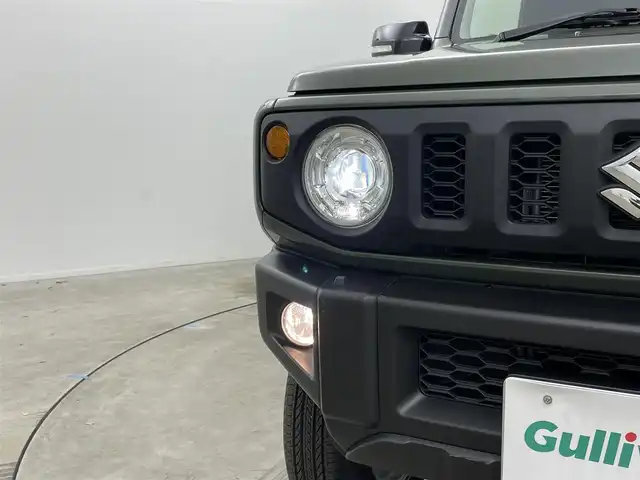 スズキ ジムニー XC 岡山県 2023(令5)年 2.9万km ジャングルグリーン アルパイン9インチナビ/X9NX1/（CD/DVD/TV/BT/USB)/バックカメラ/アルパインミラー型ドライブレコーダー/2インチリフトアップ/社外マフラー/LEDヘッドライト/フォグランプ/オートライト/スズキセーフティーサポート/社外シフト/純正フロアマット/純正ドアバイザー/クルーズコントロール/ETC/取扱説明書/スペアキー×１