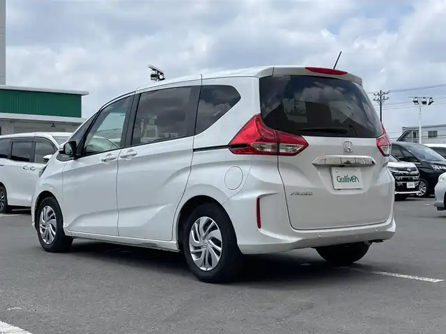 ホンダ フリード G 東京都 2022(令4)年 2万km プラチナホワイトパール 純正ナビ/バックモニター/衝突軽減ブレーキ/路外逸脱抑制機能/車線維持支援/アダプティブクルーズコントロール/シートヒーター/両側パワースライドドア/ＥＴＣ/ステアリングスイッチ/スマートキー