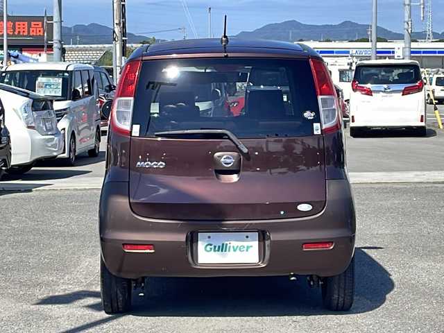 日産 モコ E ショコラティエ 徳島県 2009(平21)年 12.6万km マルーンブラウンパール CDプレーヤー/ラジオ/電動格納ミラー/シガーソケット/ヘッドライトレベライザー/ドアバイザー/スマートキー/ベンチシート/盗難防止装置/オートライト/ハロゲンヘッドライト/ダブルエアバック