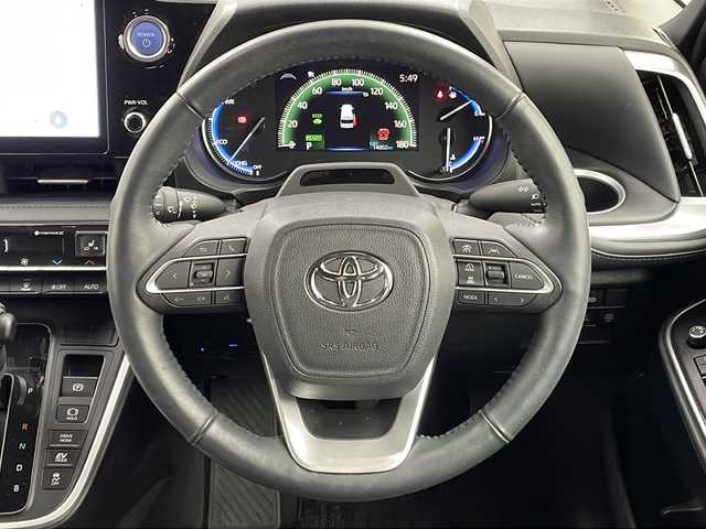 トヨタ ヴォクシー ハイブリッド S－Z 大阪府 2022(令4)年 1.4万km グリッターブラックガラスフレーク 純正10.5incディスプレイオーディオナビ/【フルセグTV/Bluetooth/HDMI/FM/AM/USB】/快適利便パッケージ(High)/・両側ハンズフリーパワースライドドア/・パワーバックドア/・前後シートヒーター/・ステアリングヒーター/・後席オットマン/・nanoe/3眼LEDヘッドライト/ブラインドスポットモニター/AC100Vコンセント/トヨタセーフティセンス/・レーダークルーズコントロール/・プリクラッシュセーフティー/・パーキングサポートブレーキ/・レーンディパーチャーアラート/・オートマチックハイビーム/・ロードサインアシスト/・ドライバー異常対応システム/オートホールド/前後コーナーセンサー/半革シート/後席サンシェード/ISOFIX