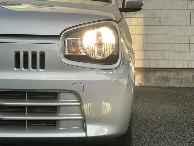 スズキ アルト X 福岡県 2016(平28)年 2.9万km シルキーシルバーメタリック 社外7インチメモリナビ【AVN7500S】/　(AM/FM/CD/DVD/Bluetooth/フルセグTV)/運転支援機能/・レーダーブレーキサポート/・誤発進抑制機能/・アイドリングストップ/・エネチャージ/・ふらつき防止機能/純正15インチアルミホイール/シートヒーター（D席）/USBポート/プッシュスタート/アイドリングストップ/純正フロアマット/電格ウィンカーミラー/ドアバイザー/スペアキー×１/保証書/取扱説明書
