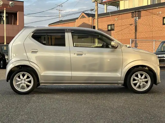 スズキ アルト X 福岡県 2016(平28)年 2.9万km シルキーシルバーメタリック 社外7インチメモリナビ【AVN7500S】/　(AM/FM/CD/DVD/Bluetooth/フルセグTV)/運転支援機能/・レーダーブレーキサポート/・誤発進抑制機能/・アイドリングストップ/・エネチャージ/・ふらつき防止機能/純正15インチアルミホイール/シートヒーター（D席）/USBポート/プッシュスタート/アイドリングストップ/純正フロアマット/電格ウィンカーミラー/ドアバイザー/スペアキー×１/保証書/取扱説明書