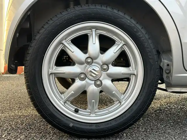 スズキ アルト X 福岡県 2016(平28)年 2.9万km シルキーシルバーメタリック 社外7インチメモリナビ【AVN7500S】/　(AM/FM/CD/DVD/Bluetooth/フルセグTV)/運転支援機能/・レーダーブレーキサポート/・誤発進抑制機能/・アイドリングストップ/・エネチャージ/・ふらつき防止機能/純正15インチアルミホイール/シートヒーター（D席）/USBポート/プッシュスタート/アイドリングストップ/純正フロアマット/電格ウィンカーミラー/ドアバイザー/スペアキー×１/保証書/取扱説明書