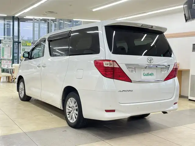 トヨタ アルファード 240X 道央・札幌 2008(平20)年 13.2万km ホワイトパールクリスタルシャイン 4WD/純正ディーラーSDナビ/  (CD/DVD/MD/AM/FM/BT/フルセグ）/ウッドコンピステアリング/左側パワースライドドア/右側イージークローザードア/HIDヘッドライト/フォグライト/12V/120W/ビルトインETC/コーナーセンサー/横滑り防止/フロントワイパーデアイサー/寒冷地仕様/ステアリングスイッチ/オートライト/オールオートパワーウィンドウ/バックカメラ/バニティミラー/純正フロアマット/純正ドアバイザー/電動格納ミラー/スマートキー