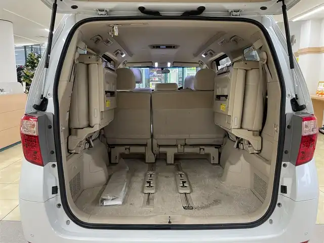 トヨタ アルファード 240X 道央・札幌 2008(平20)年 13.2万km ホワイトパールクリスタルシャイン 4WD/純正ディーラーSDナビ/  (CD/DVD/MD/AM/FM/BT/フルセグ）/ウッドコンピステアリング/左側パワースライドドア/右側イージークローザードア/HIDヘッドライト/フォグライト/12V/120W/ビルトインETC/コーナーセンサー/横滑り防止/フロントワイパーデアイサー/寒冷地仕様/ステアリングスイッチ/オートライト/オールオートパワーウィンドウ/バックカメラ/バニティミラー/純正フロアマット/純正ドアバイザー/電動格納ミラー/スマートキー