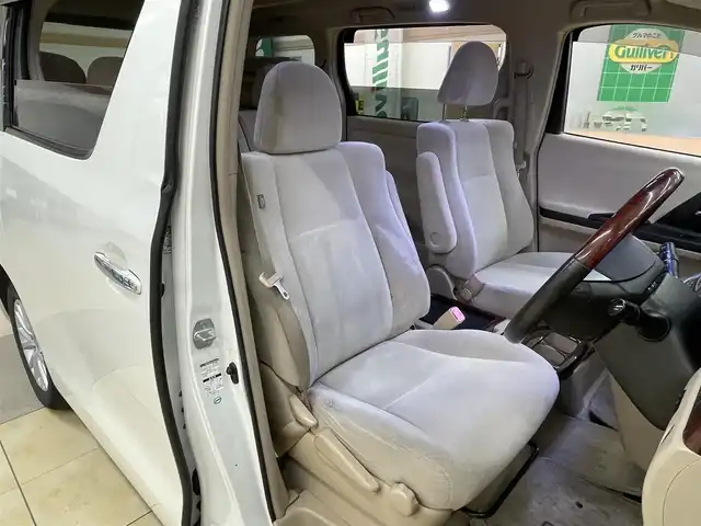 トヨタ アルファード 240X 道央・札幌 2008(平20)年 13.2万km ホワイトパールクリスタルシャイン 4WD/純正ディーラーSDナビ/  (CD/DVD/MD/AM/FM/BT/フルセグ）/ウッドコンピステアリング/左側パワースライドドア/右側イージークローザードア/HIDヘッドライト/フォグライト/12V/120W/ビルトインETC/コーナーセンサー/横滑り防止/フロントワイパーデアイサー/寒冷地仕様/ステアリングスイッチ/オートライト/オールオートパワーウィンドウ/バックカメラ/バニティミラー/純正フロアマット/純正ドアバイザー/電動格納ミラー/スマートキー