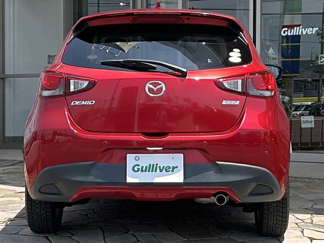 マツダ デミオ 13S Lパッケージ 静岡県 2015(平27)年 7.5万km ソウルレッドプレミアムメタリック 純正ナビ/・バックモニター/・Bluetooth/・フルセグTV/・USB/・AUX/・CD/DVD/・ステアリングスイッチ/主要装備/・プッシュスタート/・ETC車載器/・衝突被害軽減システム/・ハーフレザーシート/・LEDヘッドライト/・オートライト/・純正ＡＷ/・スマートキー/・スペアキー/・アイドリングストップ/・コーナーセンサー