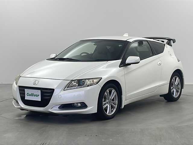 ホンダ ＣＲ－Ｚ α 栃木県 2010(平22)年 12.8万km プレミアムホワイトパール 社外７インチナビ/（CD/DVD/FM/AM/iPod)/バックカメラ/横滑り防止装置/クルーズコントロール/パドルシフト/電動格納ミラー/ステアリングリモコン/革巻きステアリング/純正１６インチAW/スペアキー/オートエアコン/スマートキー