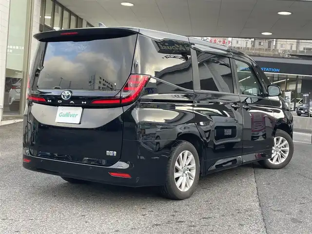 トヨタ ノア ハイブリッド G 長崎県 2023(令5)年 2万km アティチュードブラックマイカ ワンオーナー/ETC2.0/純正10.5インチマルチメディアシステム（ナビ/Bluetooth/FM/AM/TV/AppleCarPlay）/純正16インチアルミホイール/純正フロアマット/純正ドアバイザー/キーレス/レーダークルーズコントロール/ビークルスタビリティコントロール/レーントレーシングアシスト/オートヘッドライト/オートハイビーム/SRSエアバッグ(W＋サイド)/カーテンエアバッグ/バックカメラ/前後コーナーセンサー/衝突軽減システム/取扱説明書/記録簿/保証書/マルチメディアシステム取扱説明書